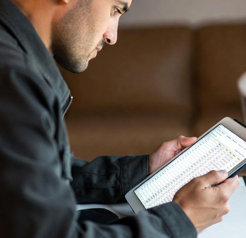 reviewing race statistics on a tablet